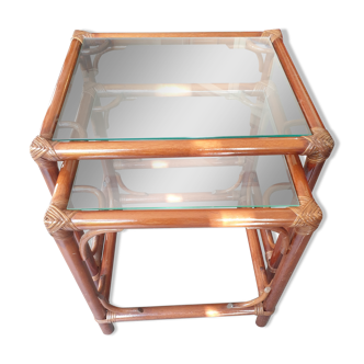 Nesting tables in rattan bamboo and glass