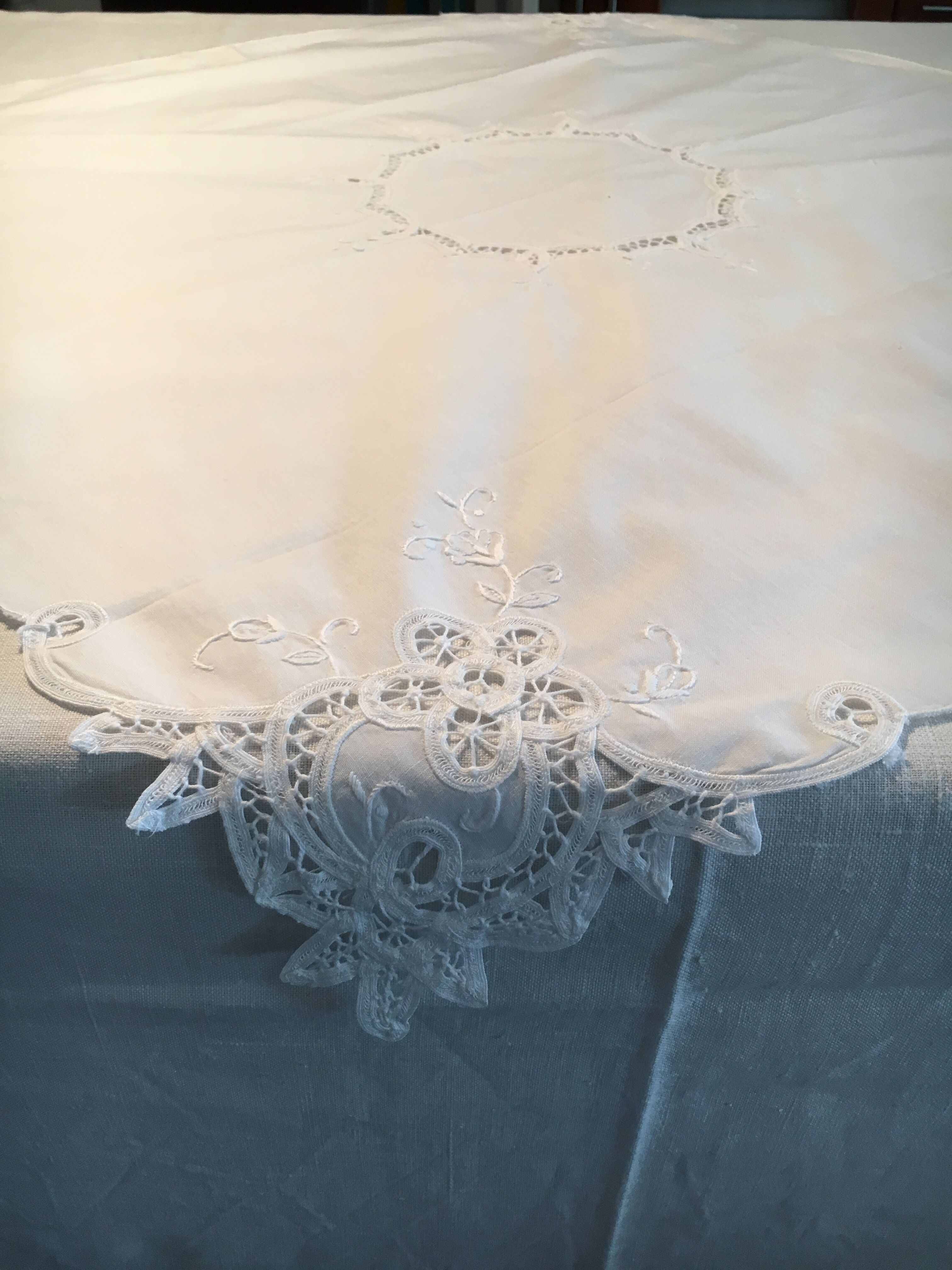 Old embroidered white cotton tablecloth