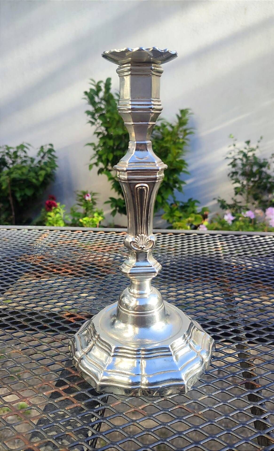 Magnificent pair of silver candlesticks.
