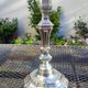 Magnificent pair of silver candlesticks.
