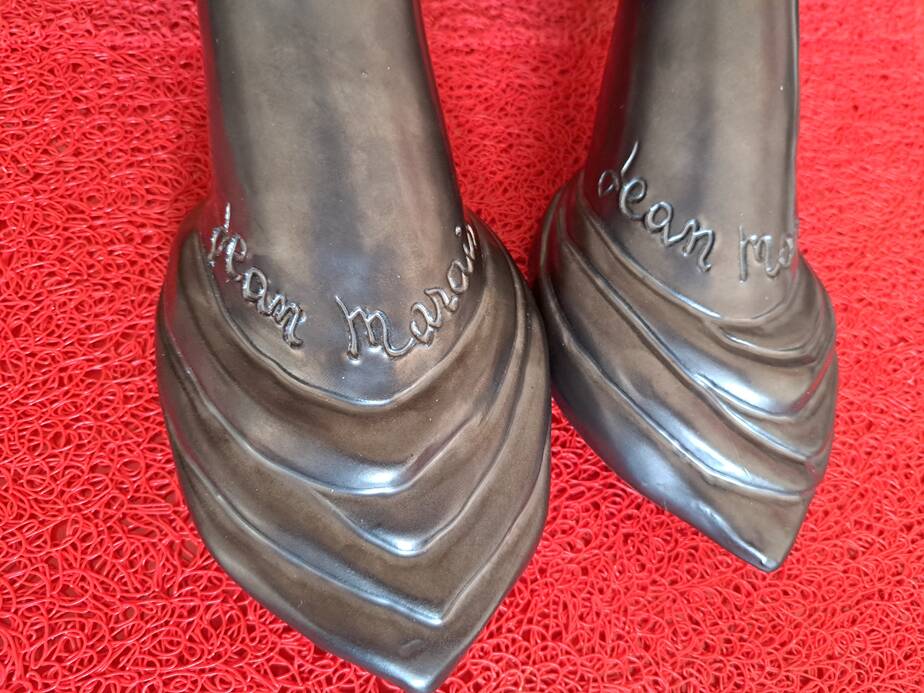 Pair of sculptural ceramic wall lights by Jean Marais