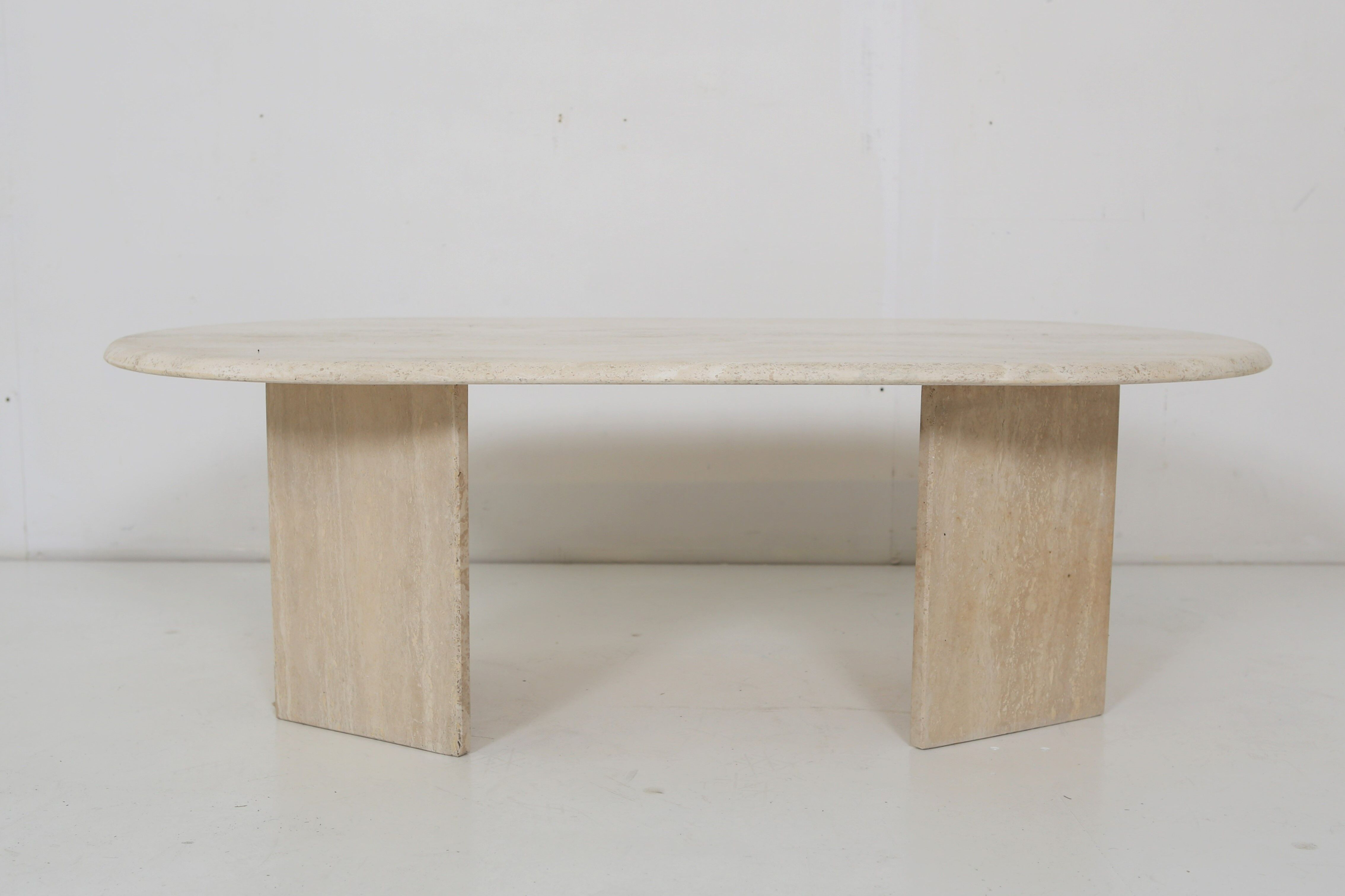 Oval travertine coffee table