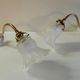 Swan neck wall lights in porcelain, brass and glass - mid 20th century.