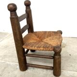Brutalist chair in wood and straw