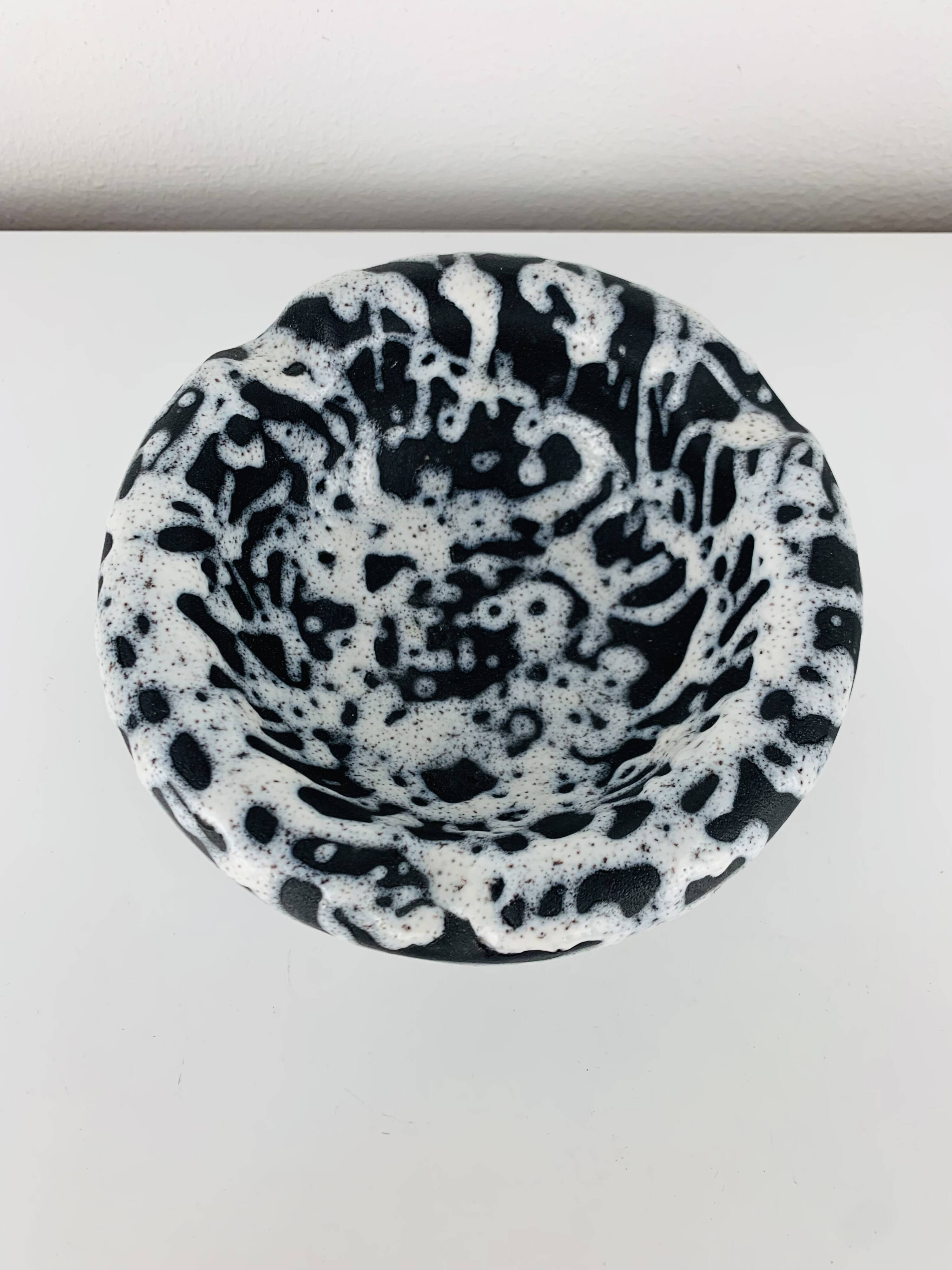 Ashtray and pocket tray by Marius Giuge, fat lava ceramic.