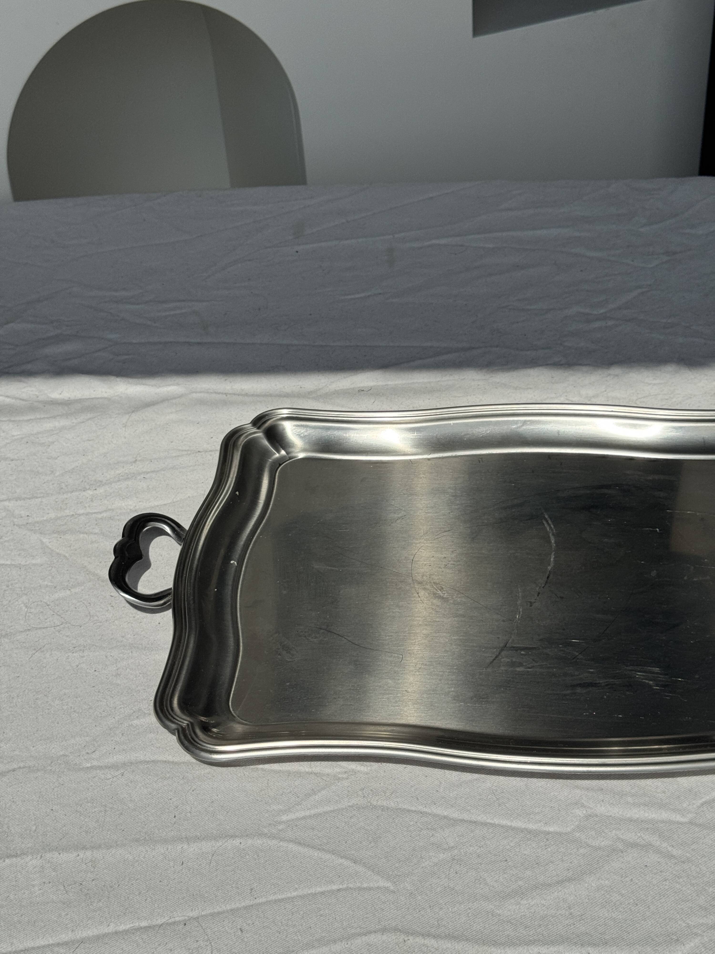 Guy Degrenne silver stainless steel serving tray with an eventful shape