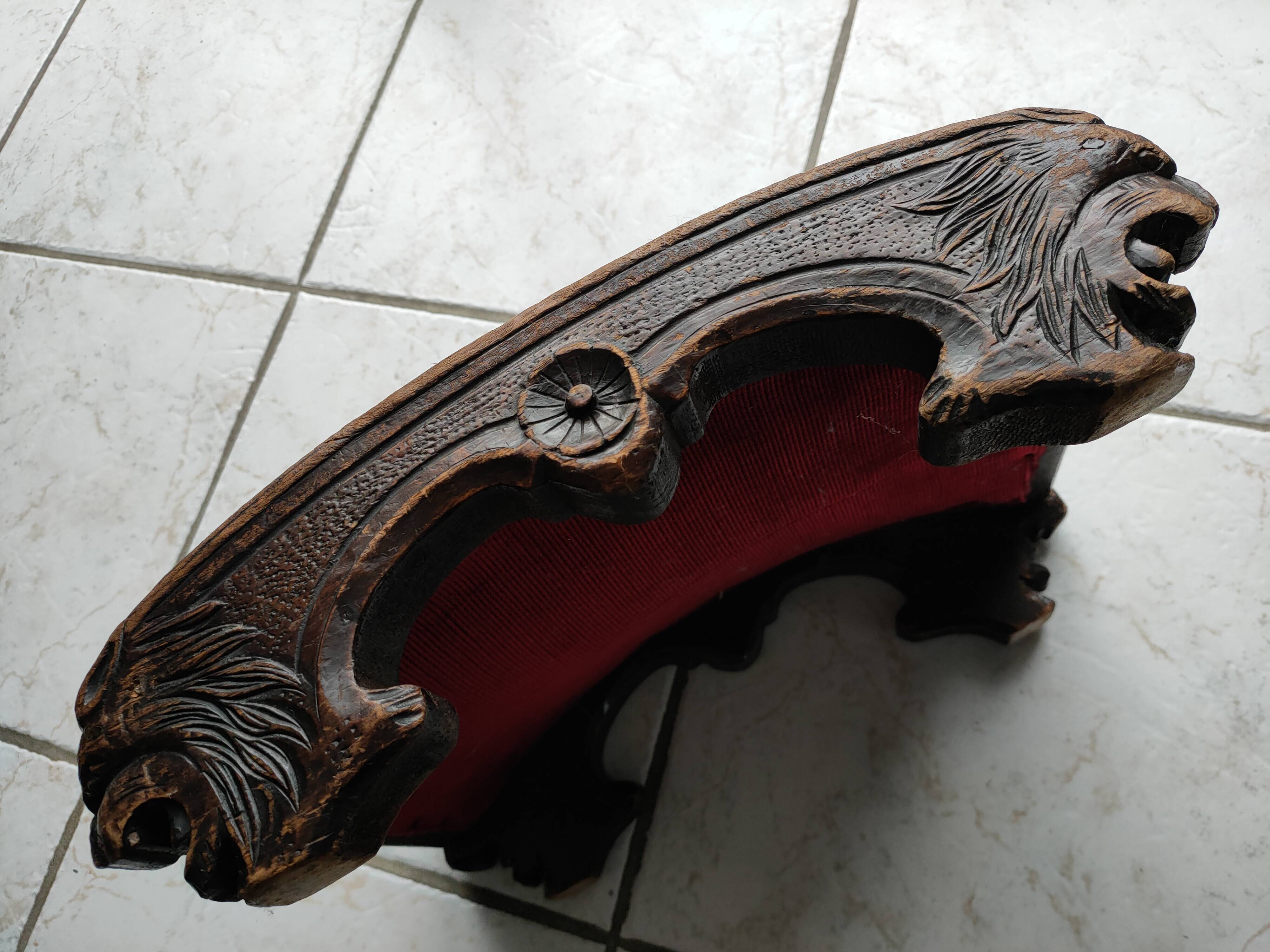 Red velvet footrest or prie-dieu