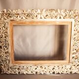Carved wooden frame. carved wooden frame with floral motifs.
