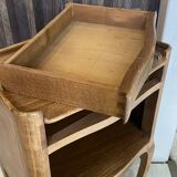 A bedside table with a drawer and a niche in Louis XV style.