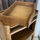 A bedside table with a drawer and a niche in Louis XV style.