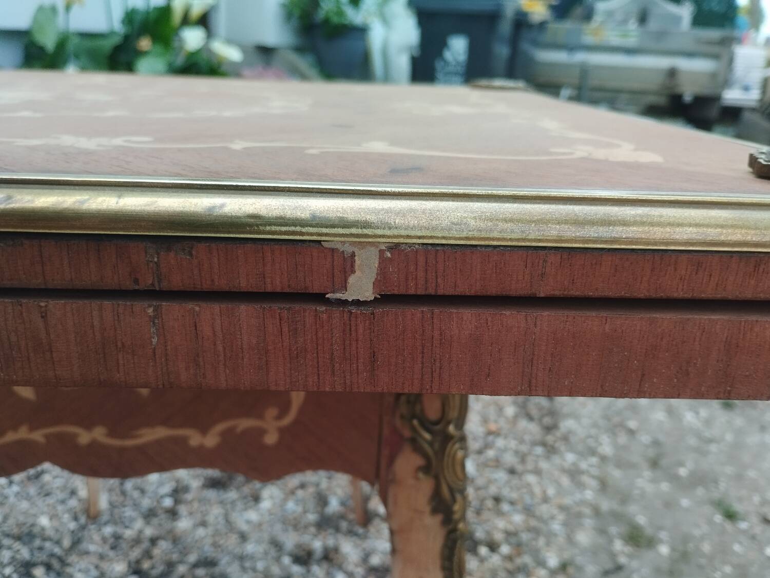 Antique game table in Louis XVI style with marquetry.