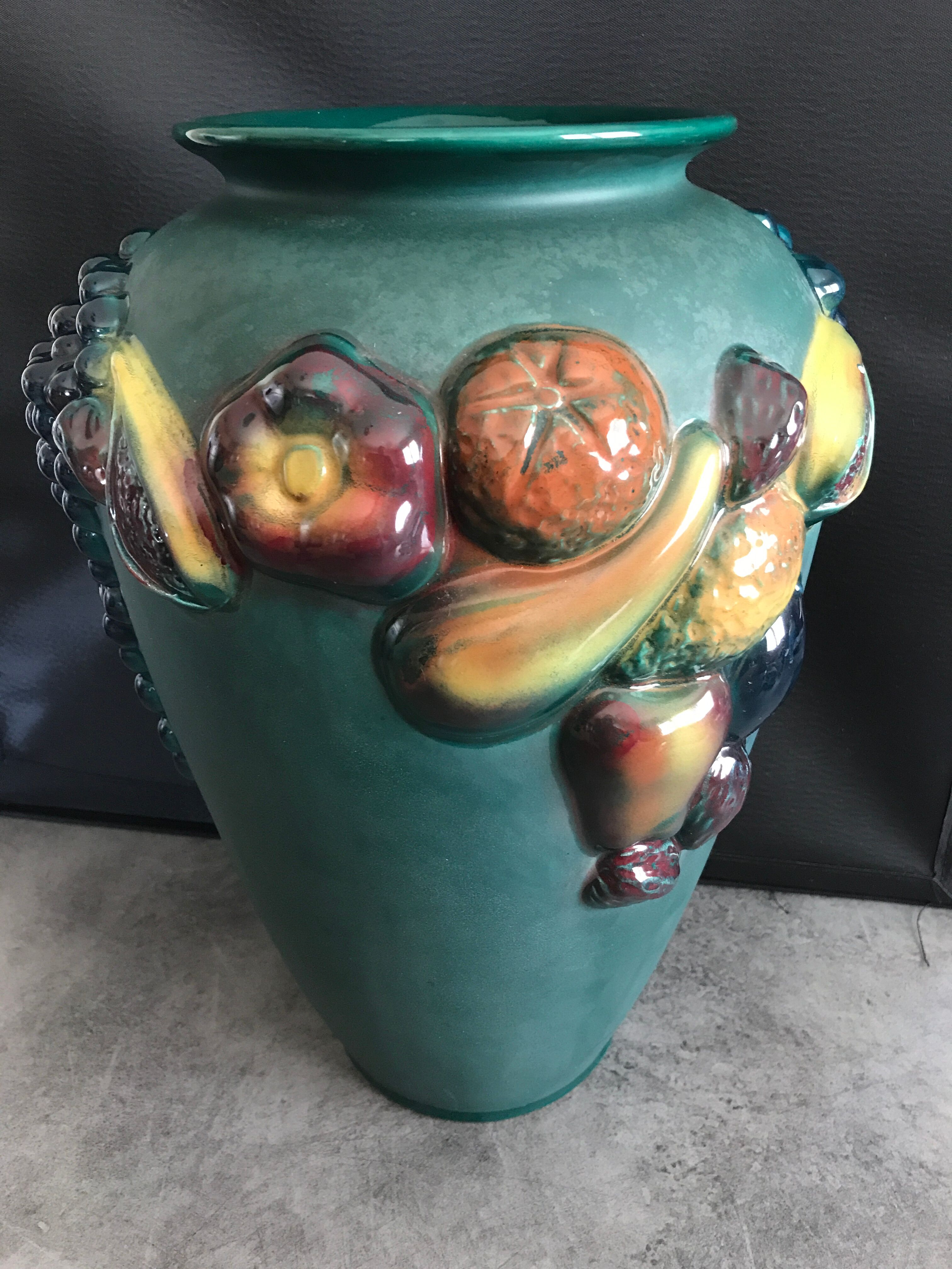 Green ceramic vase with polychrome decoration of fruits and vegetables in relief 33.5 cm