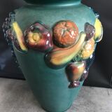 Green ceramic vase with polychrome decoration of fruits and vegetables in relief 33.5 cm