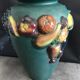 Green ceramic vase with polychrome decoration of fruits and vegetables in relief 33.5 cm