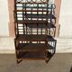 Wicker stand with scrolls shelf