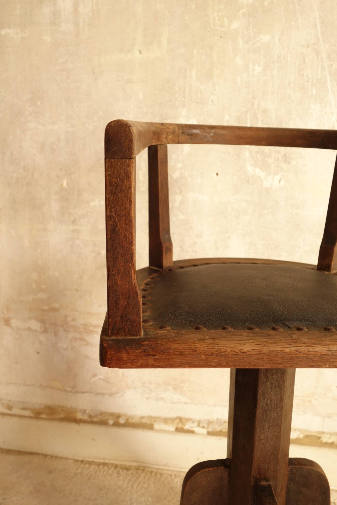 Antique wooden swivel chair