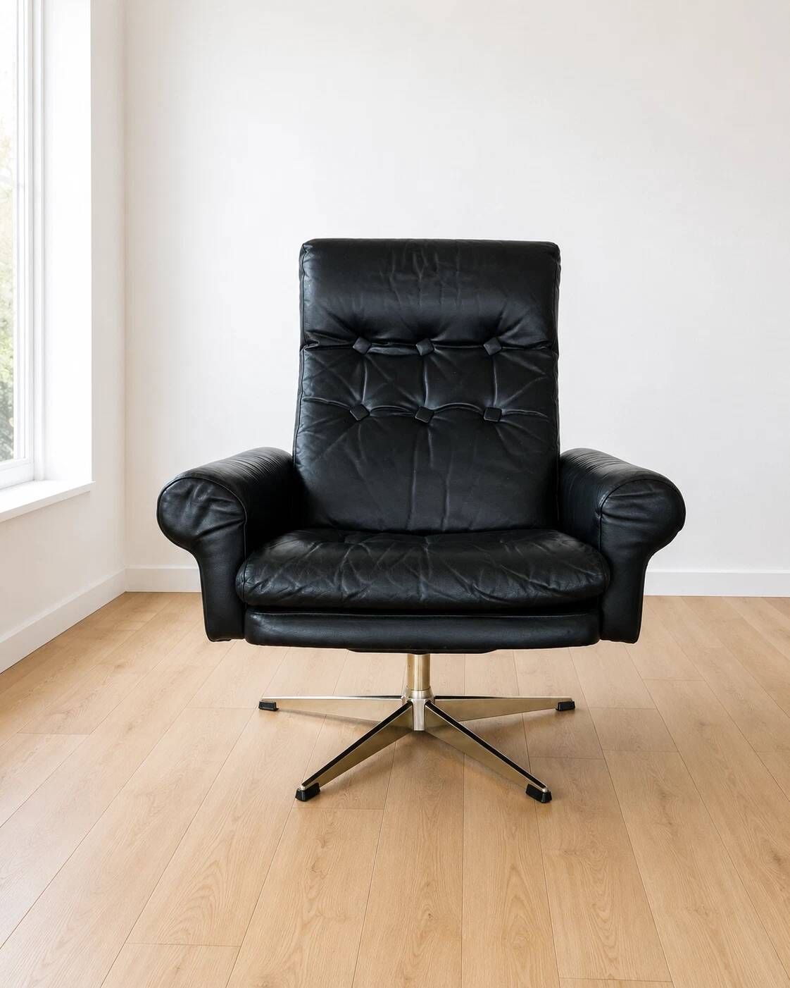 Vintage Danish mid-century black leather swivel chair 1970s