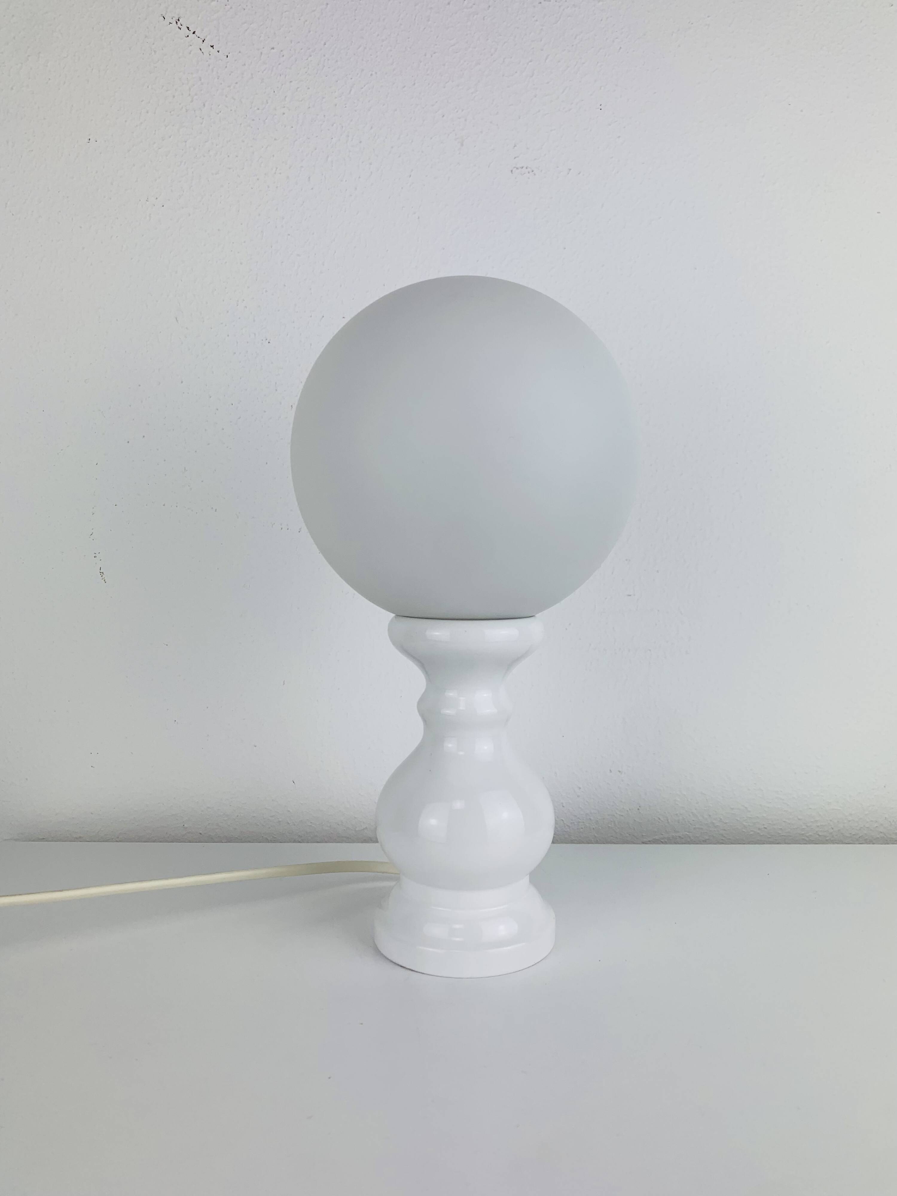 Turned wood lamp with opaline glass globe, 1970s