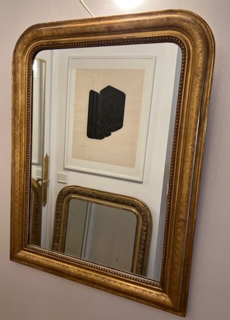 Old mirror Louis-Philippe in gilded wood