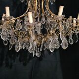 House Lucien Gau's gilded bronze and crystal chandelier