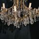 House Lucien Gau's gilded bronze and crystal chandelier