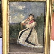 Oil on framed panel, young girl in front of a landscape signed Vico.