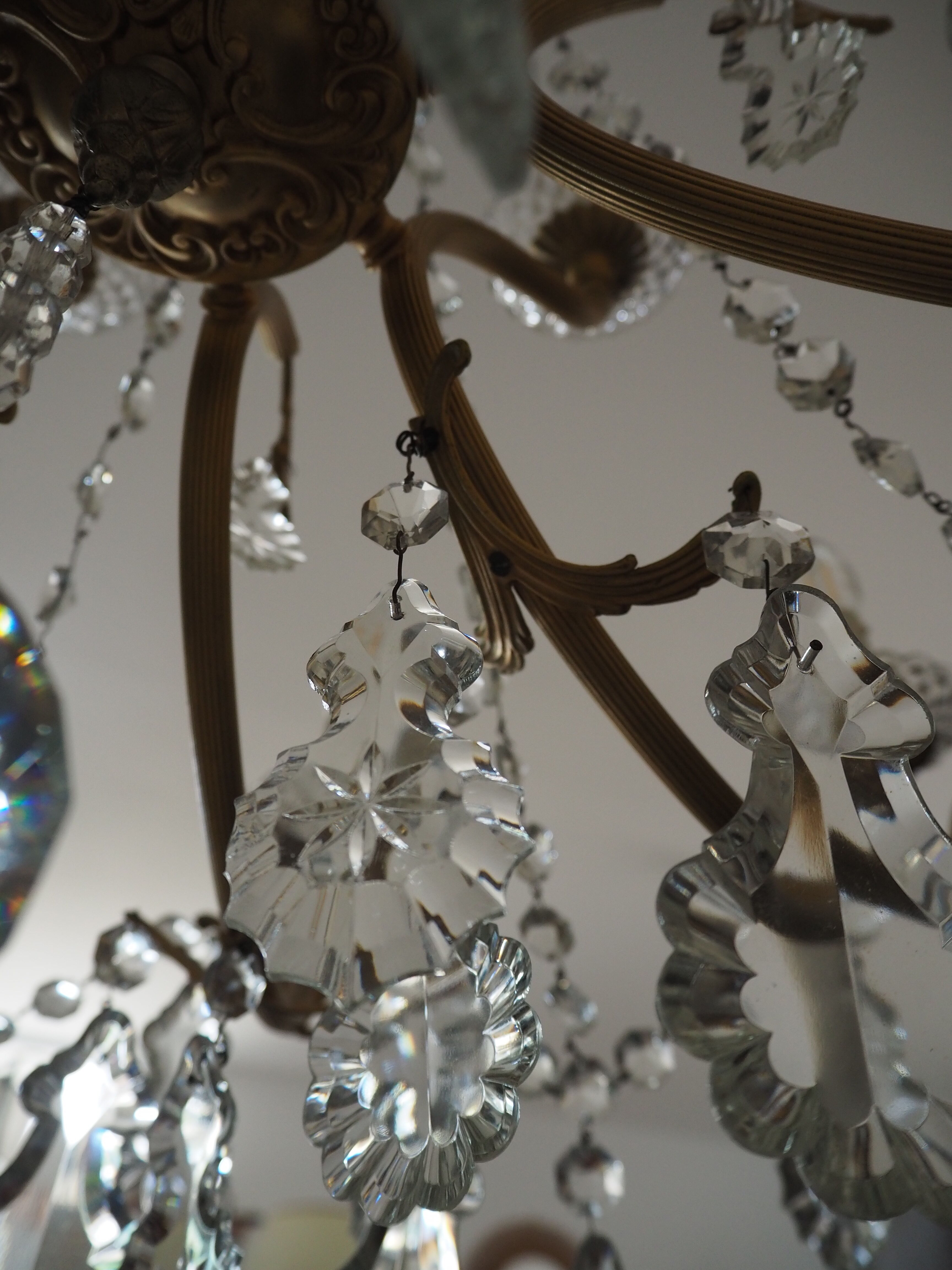 Chandelier 12 lamps with grapevines in crystal, bronze and regulated