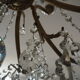 Chandelier 12 lamps with grapevines in crystal, bronze and regulated