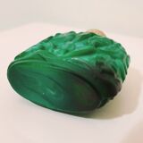 Glass bottle of malachite