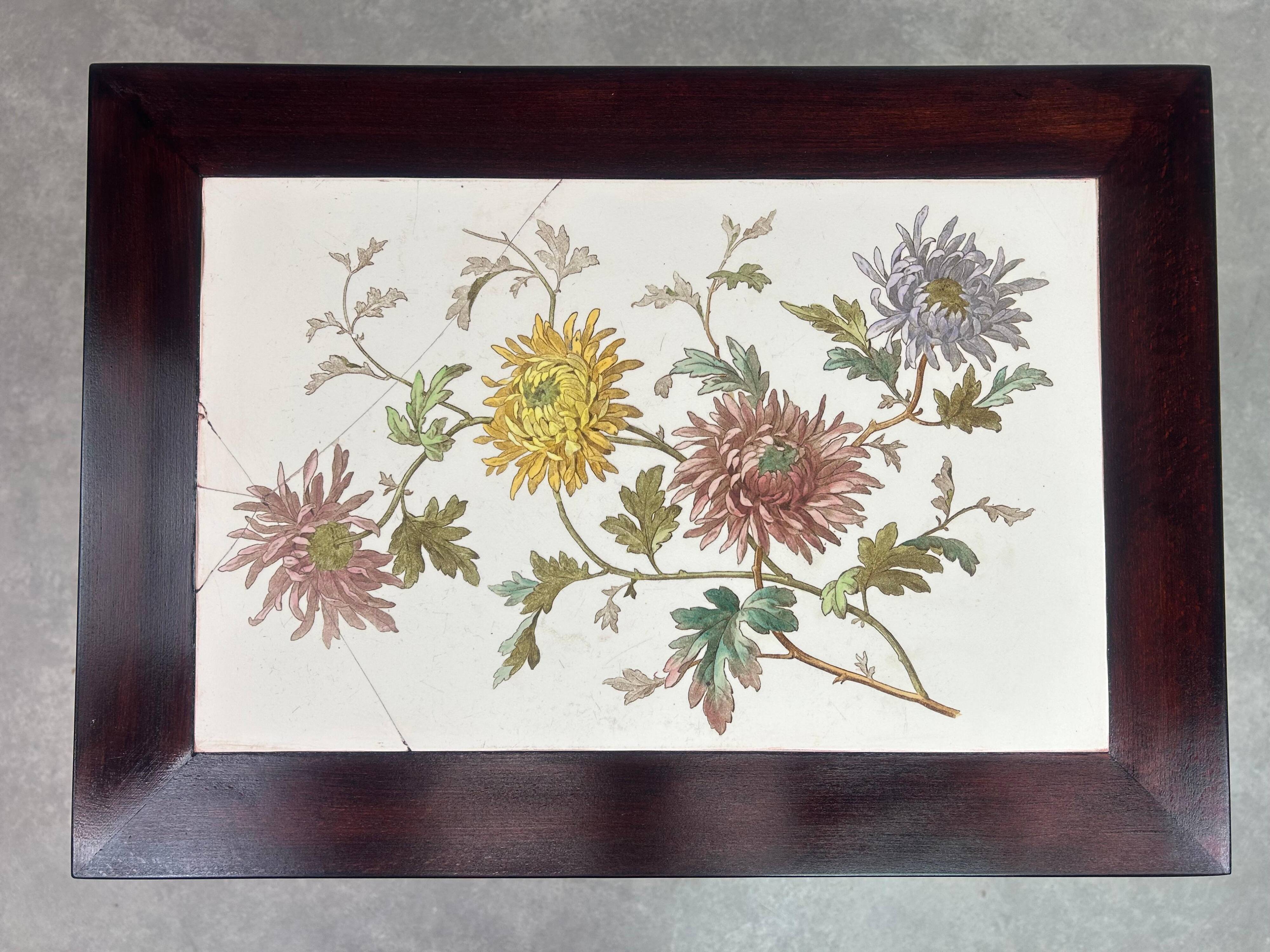 Nested tables in curved wood with ceramic top by Thonet.