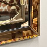 Rectangular Schöninger mirror with bronze-tinted glass and brass detailing, German