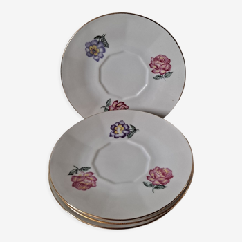 Set of flowered saucer cups