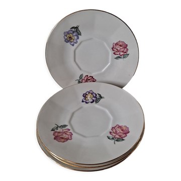 Set of flowered saucer cups