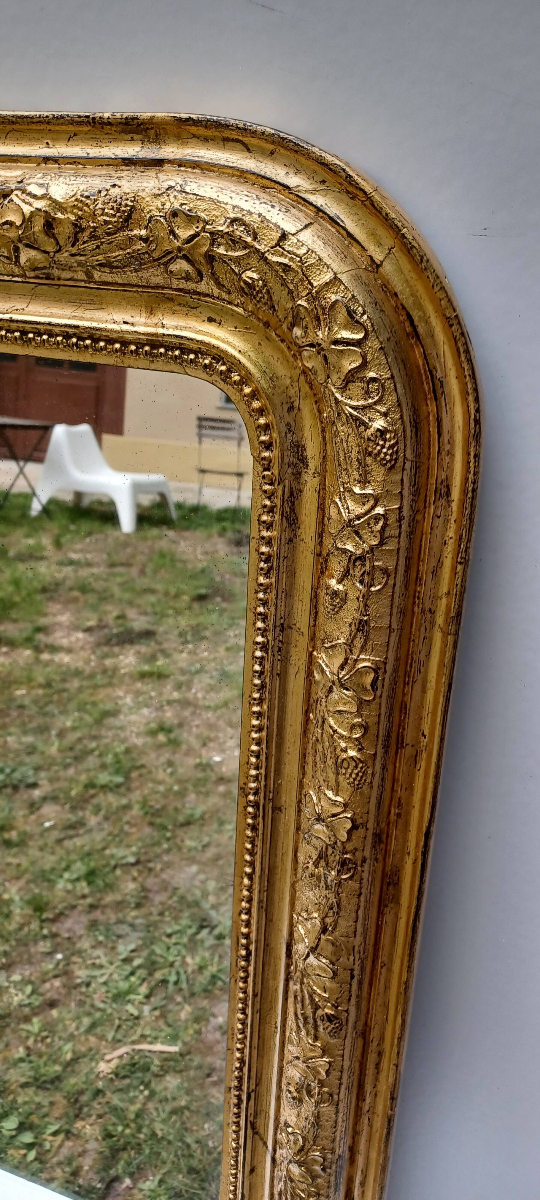 Golden mirror in louis-philippe style around 1870