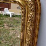 Golden mirror in louis-philippe style around 1870
