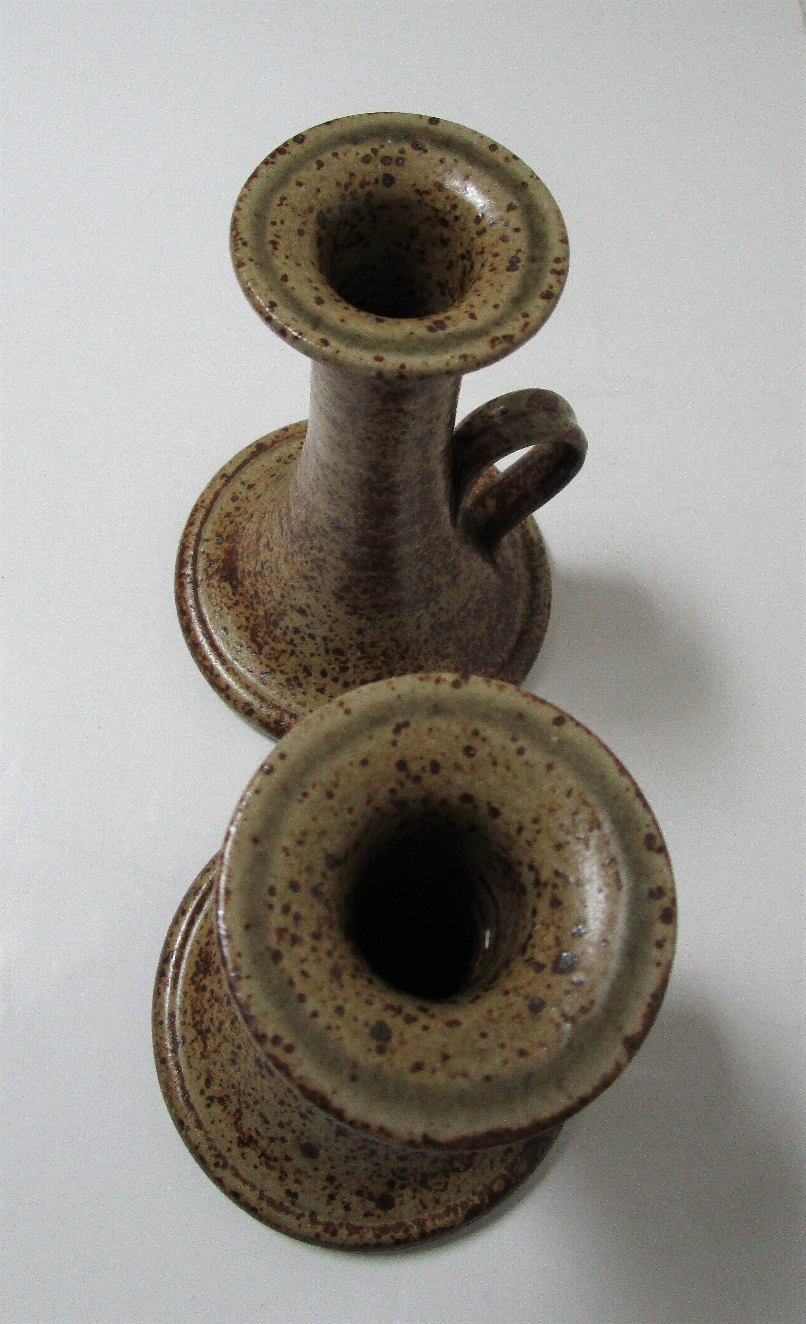 Pair of vintage sandstone candlesticks