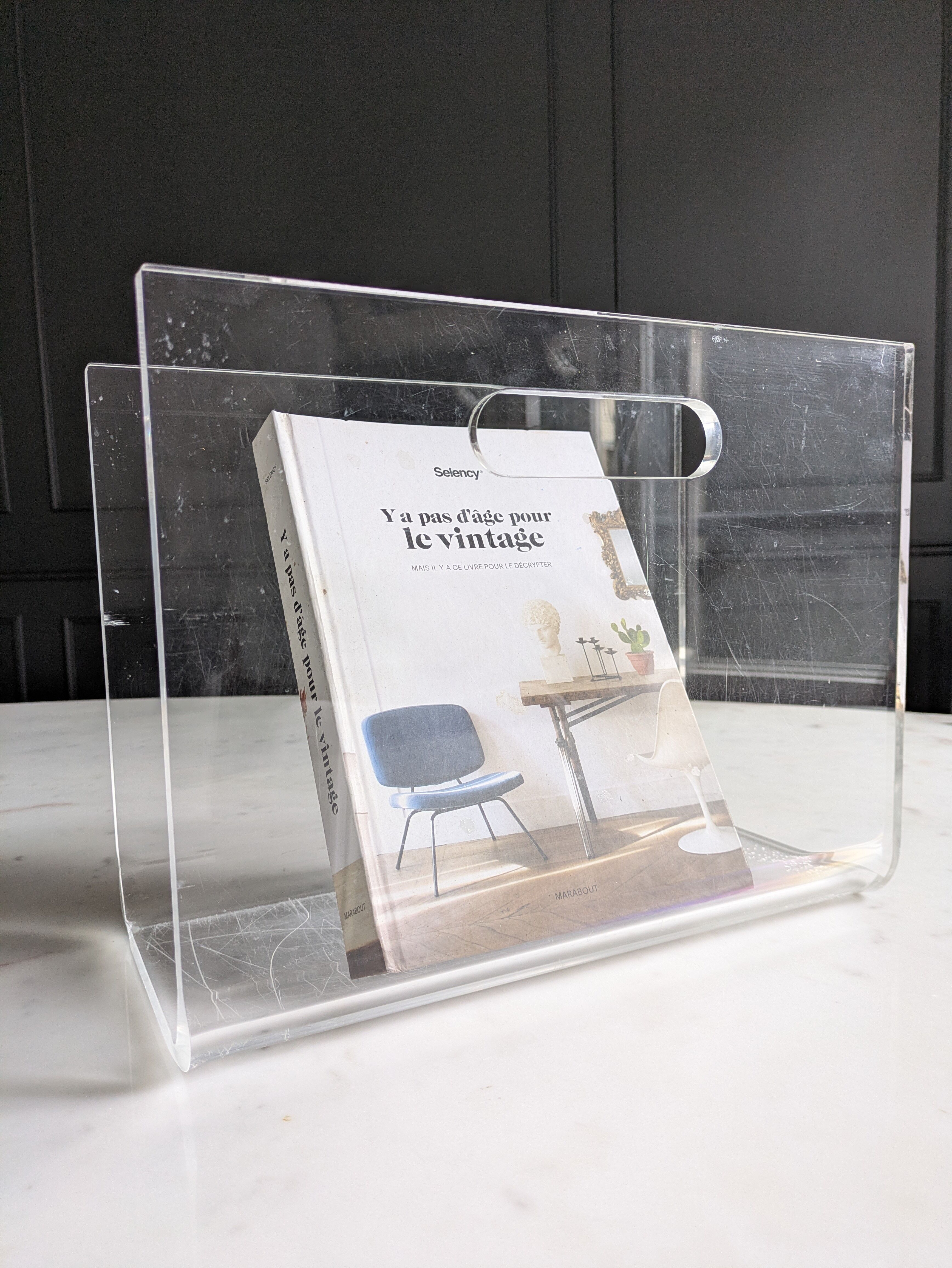Plexiglass magazine rack by David Lange
