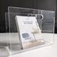 Plexiglass magazine rack by David Lange