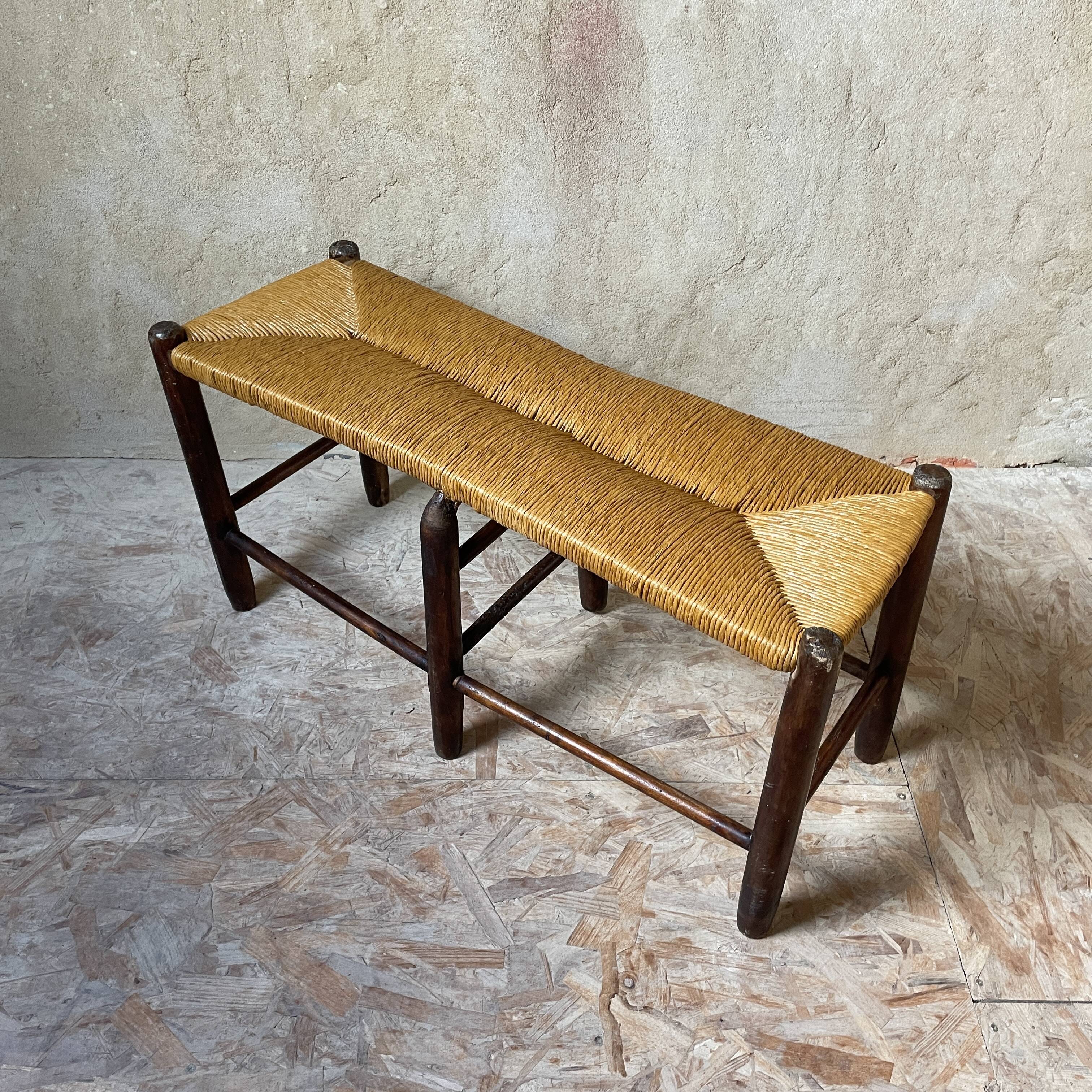 Wooden bench and rustic straw