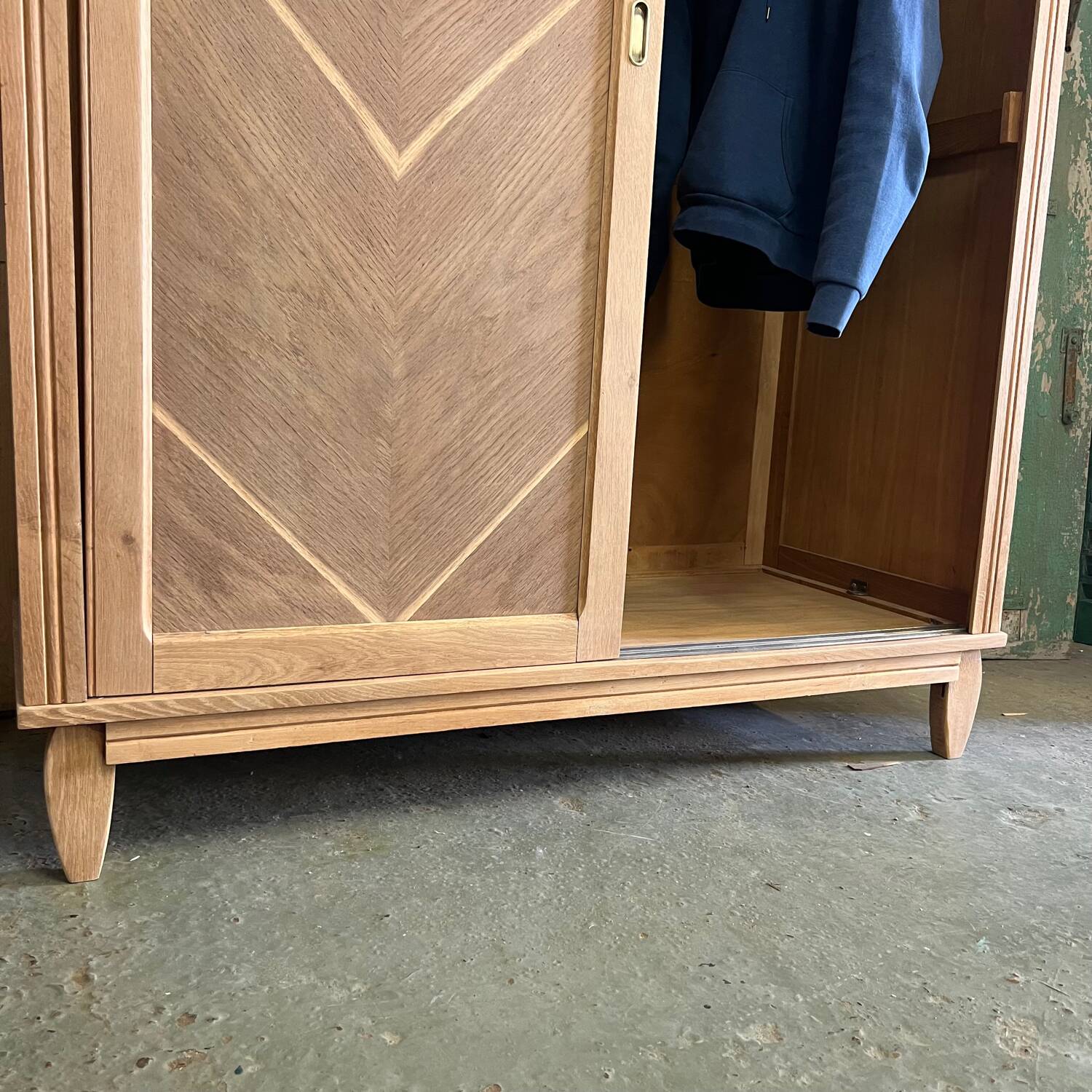 Vintage sliding wardrobe in raw oak