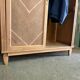 Vintage sliding wardrobe in raw oak