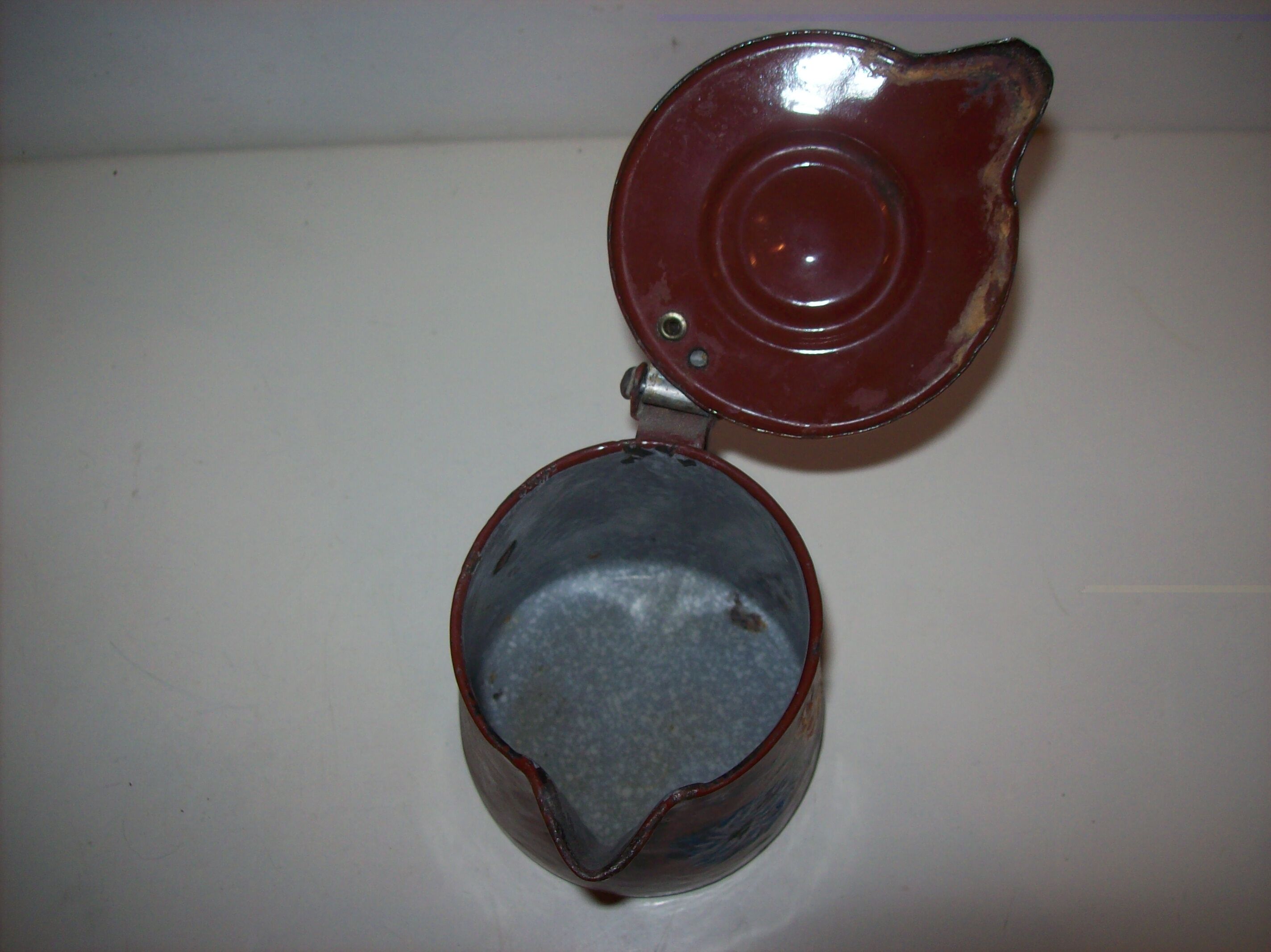 Painted enamelled teapot