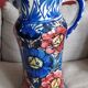 Large vase with floral decoration