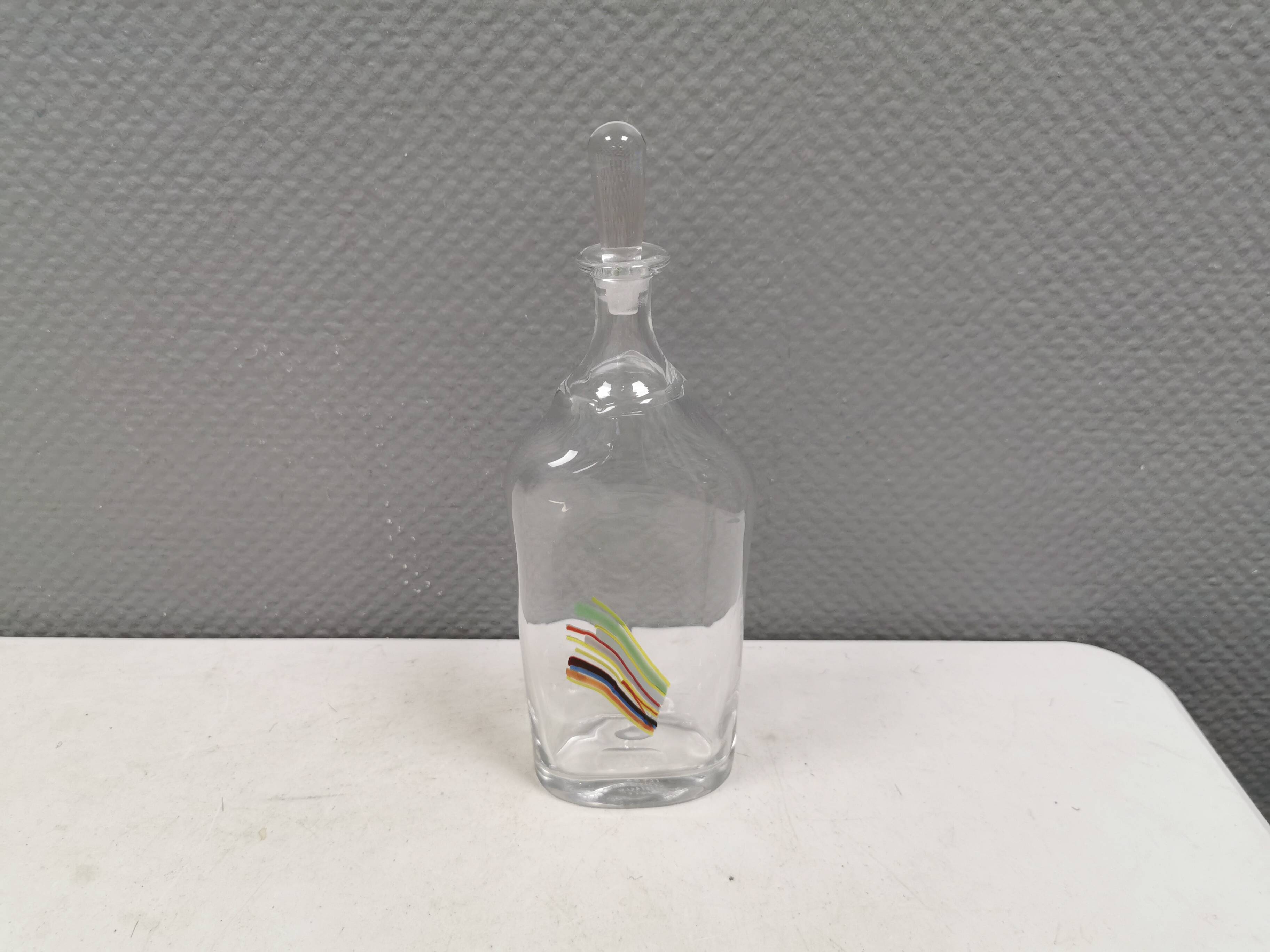 A  Bertil Vallien carafe with stopper for Kosta Boda, 1980s. Rainbow series