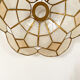 Suspension in mother-of-pearl and two-tone brass