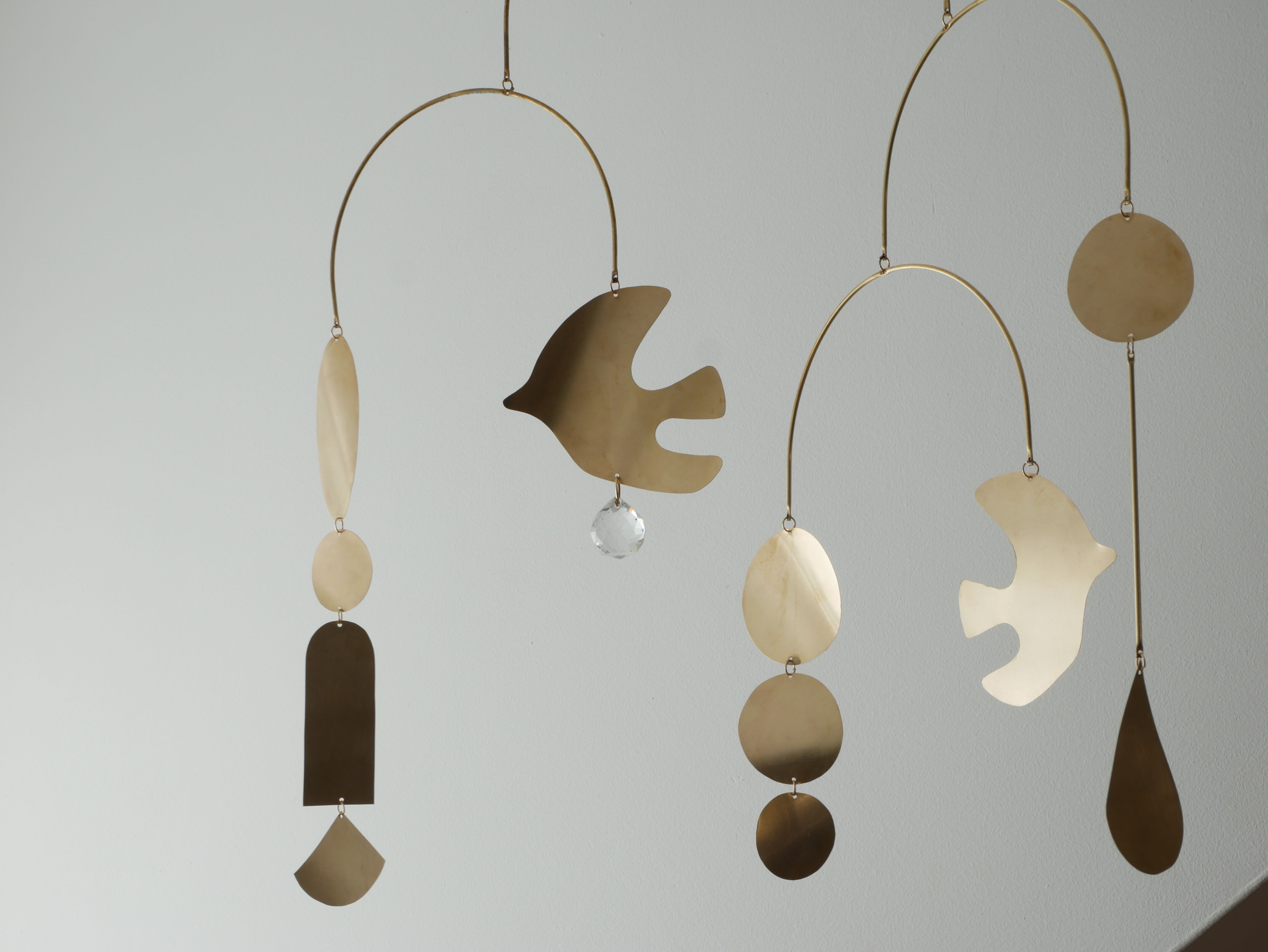 Mobile model Rana . Mobile in abstract brass.