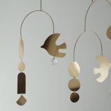 Mobile model Rana . Mobile in abstract brass.