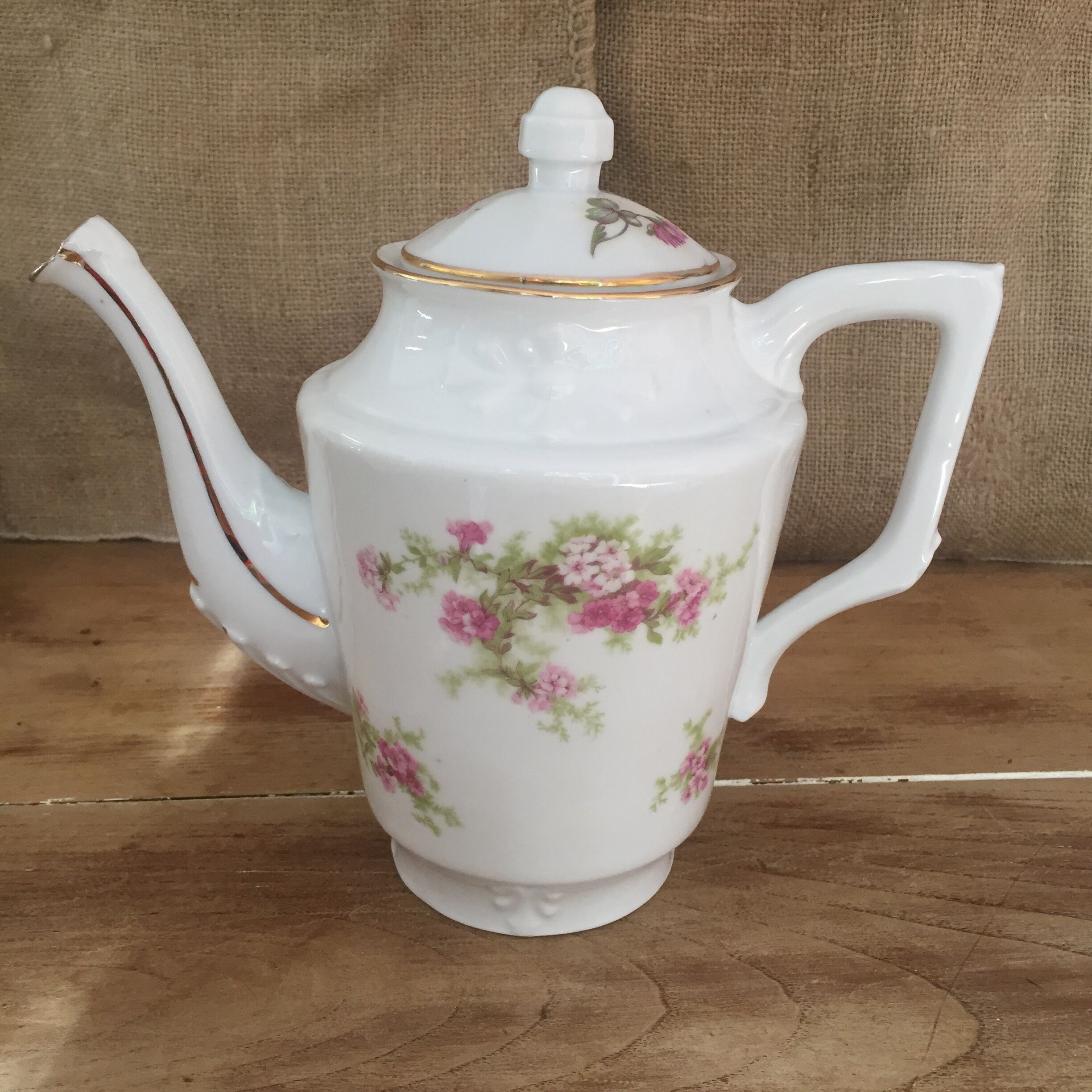 Old porcelain tea and coffee maker
