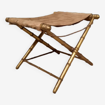 Folding stool in gilded wood