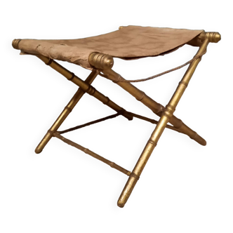 Folding stool in gilded wood